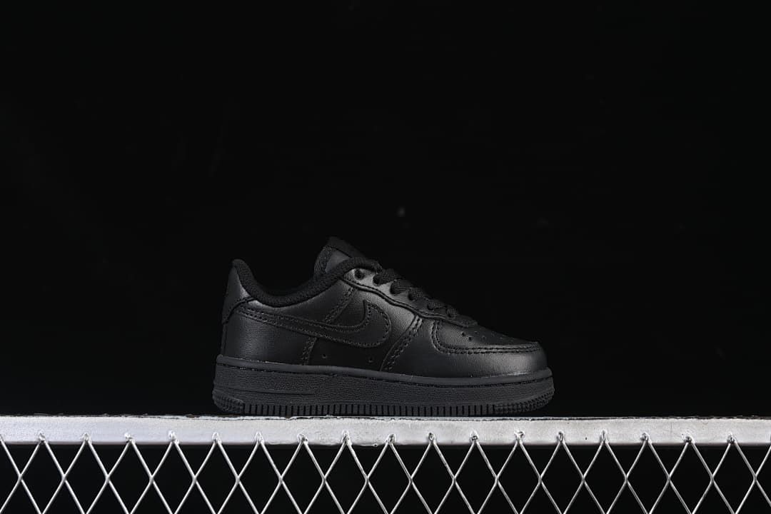 Side profile of the black low-top sneaker