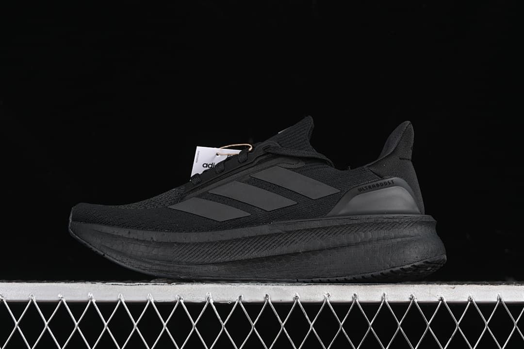 Side view of a black adidas Ultraboost 5X shoe