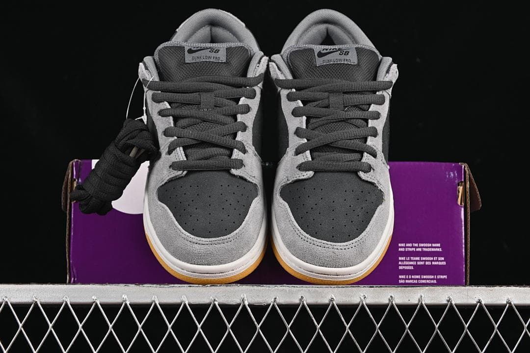 Front view of the pair with perforated toe panels and gum-colored outsoles