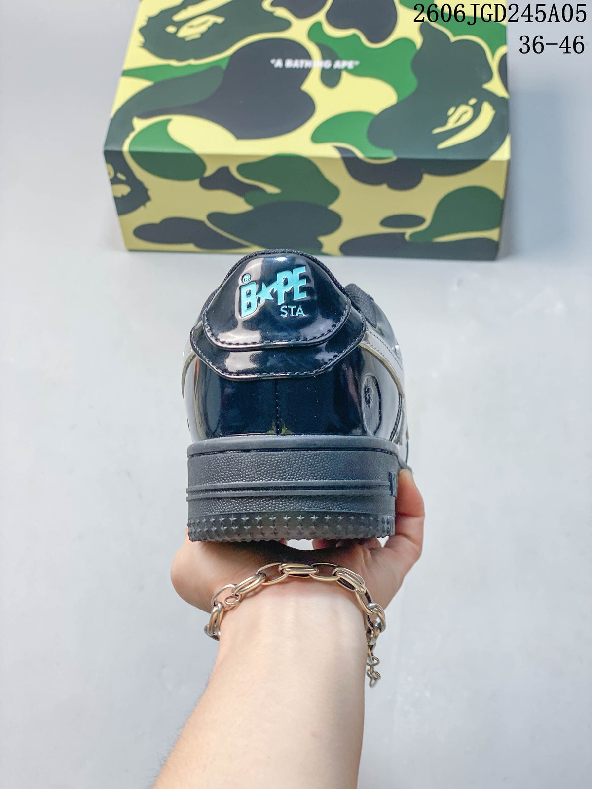 Rear view of a glossy navy sneaker with BAPE STA branding and a dark sole