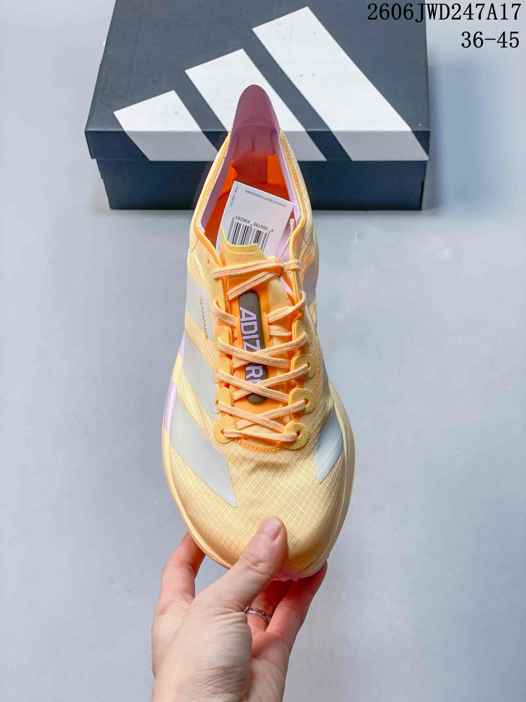 Top view of the running shoe showing its laces, patterned upper and contrasting accents.