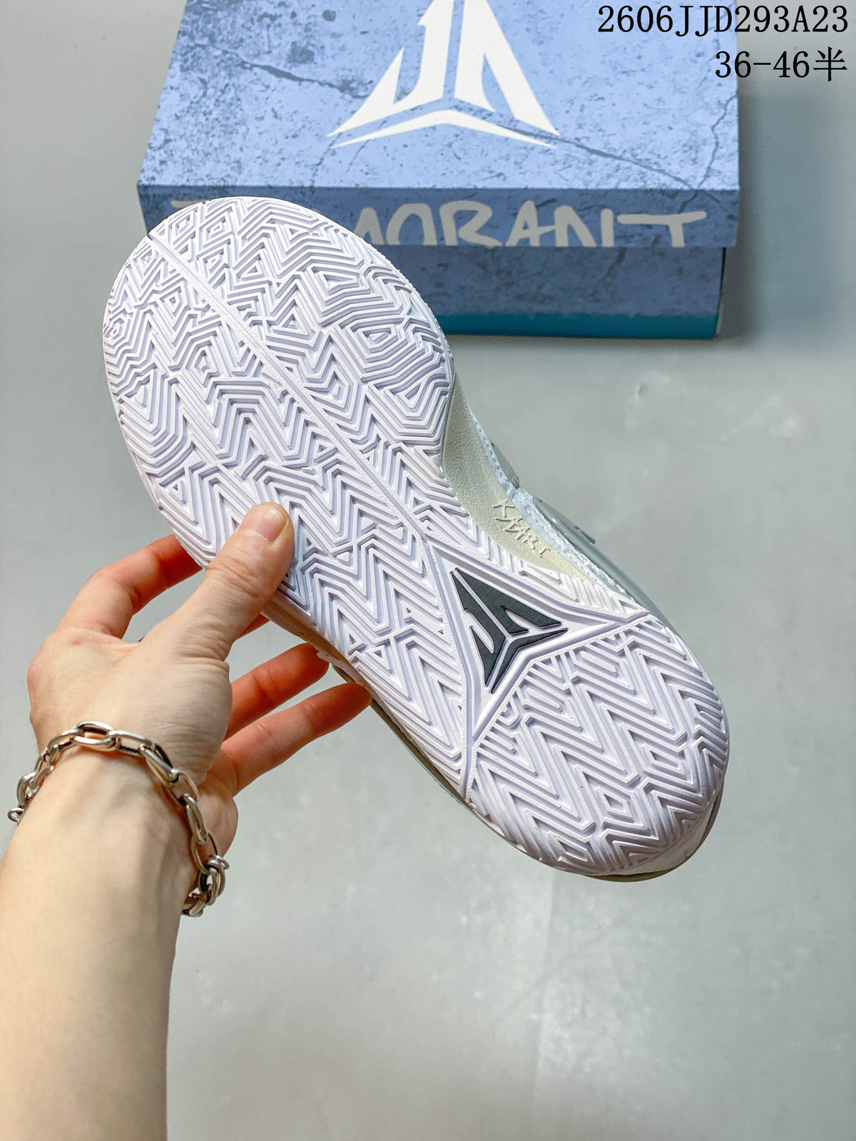 Close-up of the Ja 1 EP shoe's patterned white outsole.