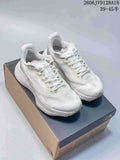 Pair of light-colored The North Face Alta Mesa 500 running shoes on a shoebox