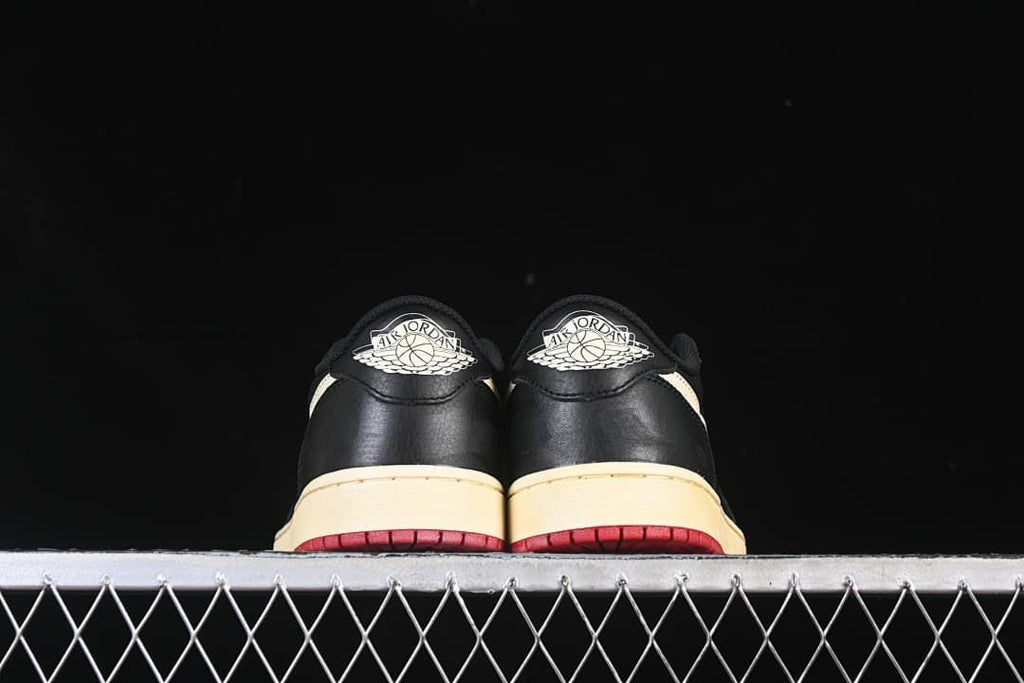 Rear view of both shoes with Air Jordan Wings logos