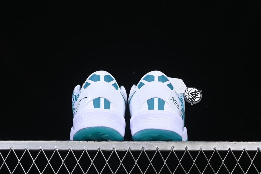 Rear view of the pair showing teal heel accents