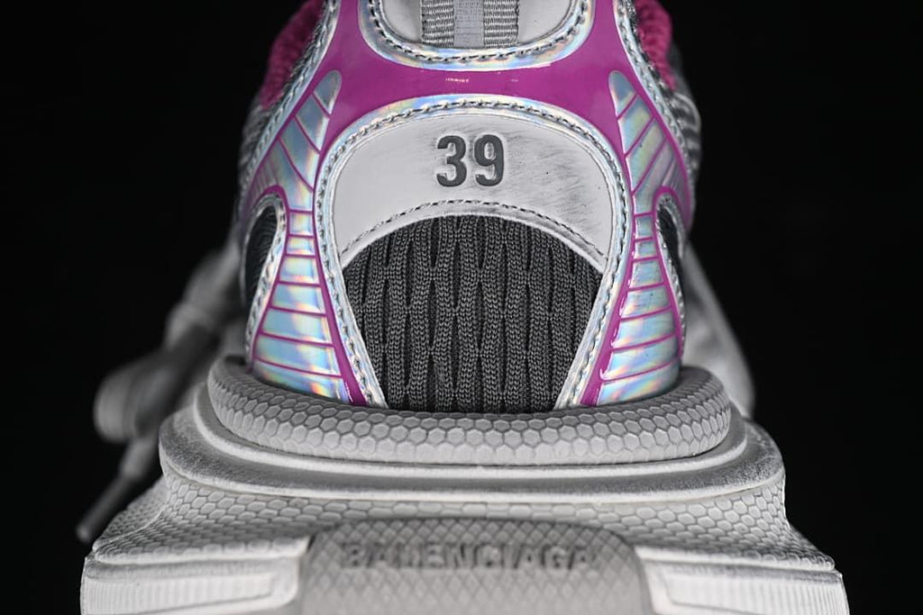 Rear view of the sneaker with size 39 marking and iridescent-look accents
