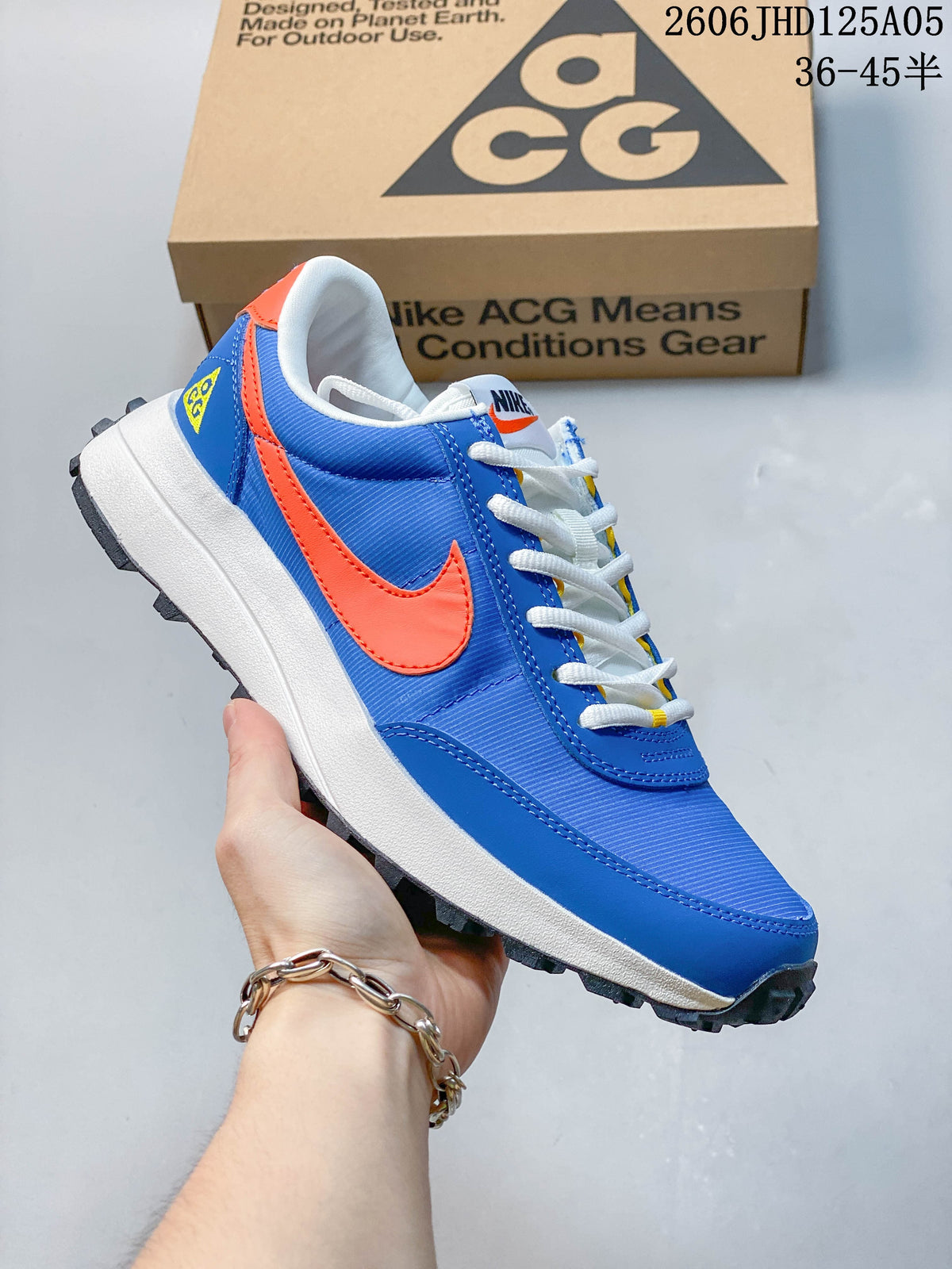 Side view of bright blue and orange Nike ACG LDV sneaker