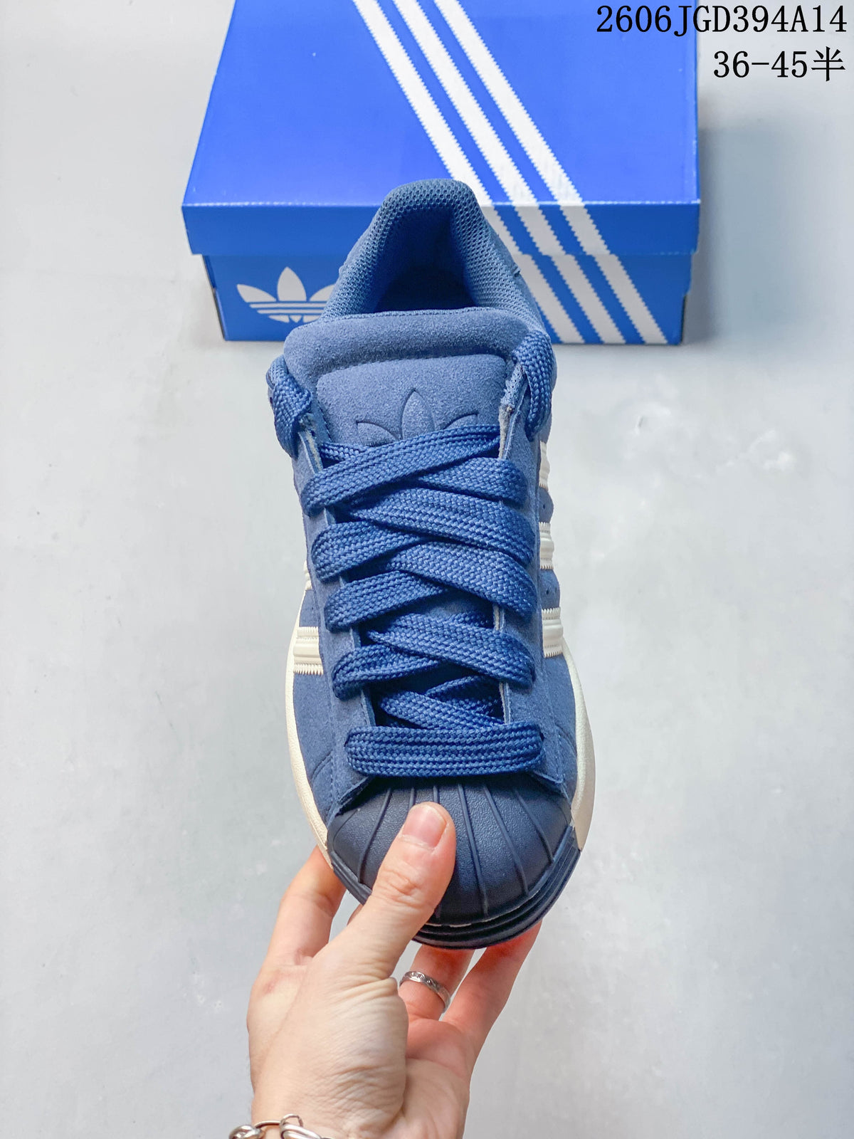 Front view showing the laces and shell-style toe cap