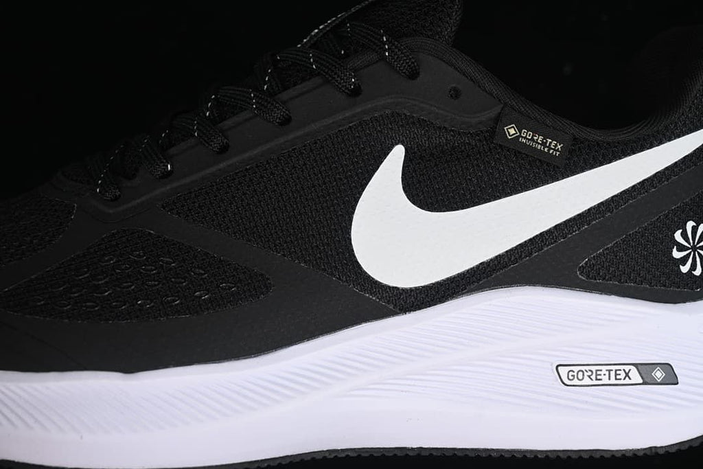 Close-up of the black upper, white Swoosh, and GORE-TEX markings