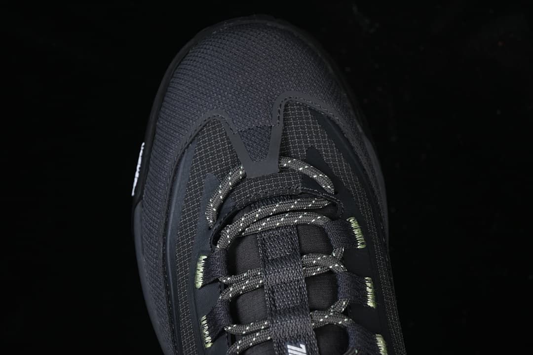 Top-down close-up of the shoe toe and lacing