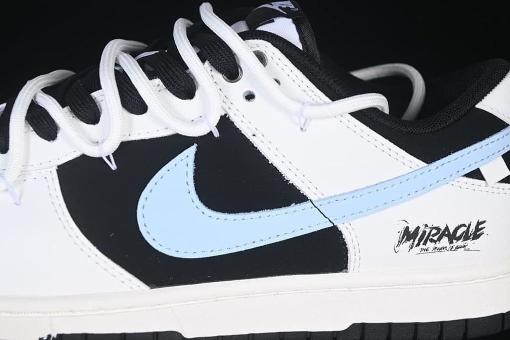 Close-up of the light blue Swoosh and Miracle heel graphic