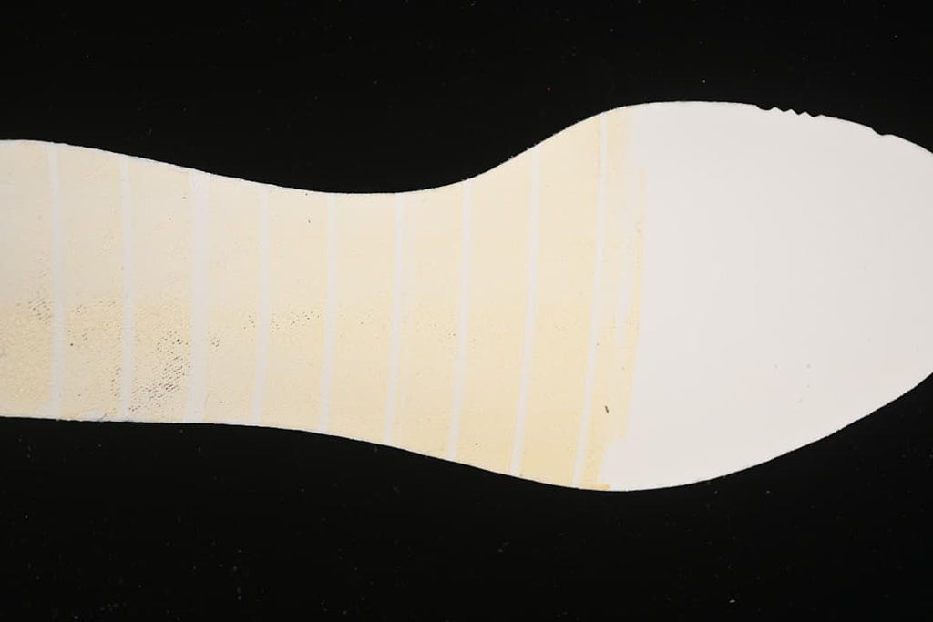 Close-up of the light-colored shoe outsole