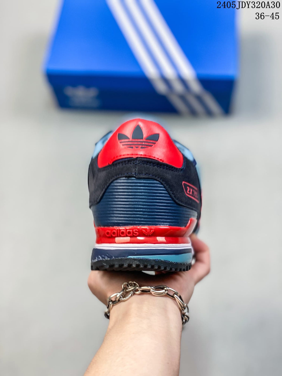 Rear view of the Adidas ZX 750 showing navy and red heel details.