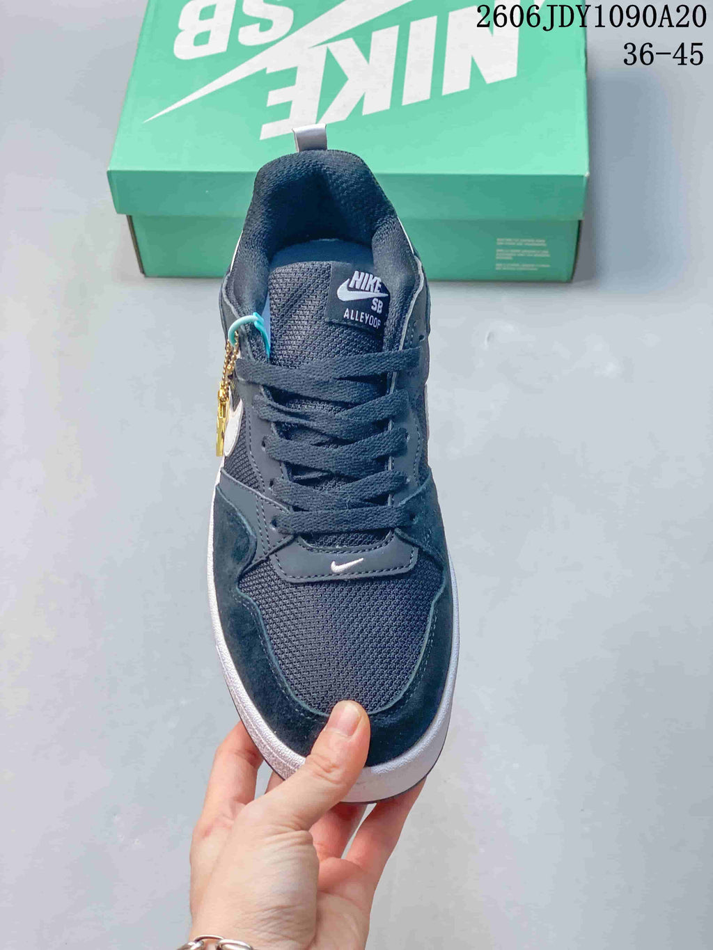 Front view of a navy Nike SB Alleyoop shoe with lace-up closure