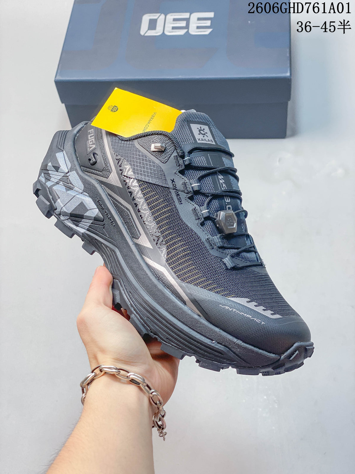 Side view of the charcoal gray Kailas FUGA EX330 trail shoe
