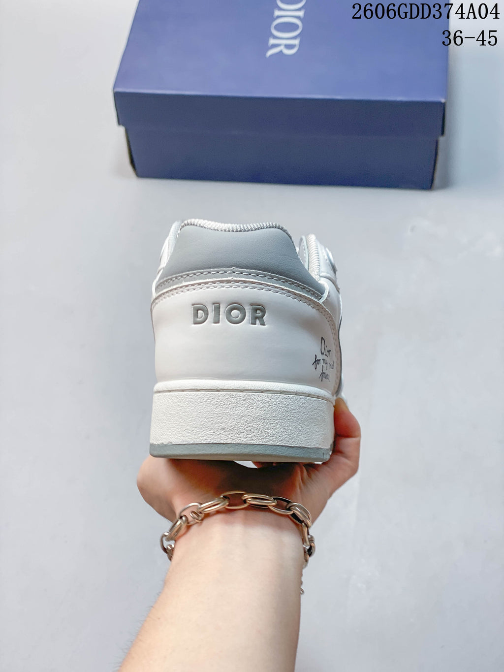 Rear view of the sneaker with Dior lettering on the heel