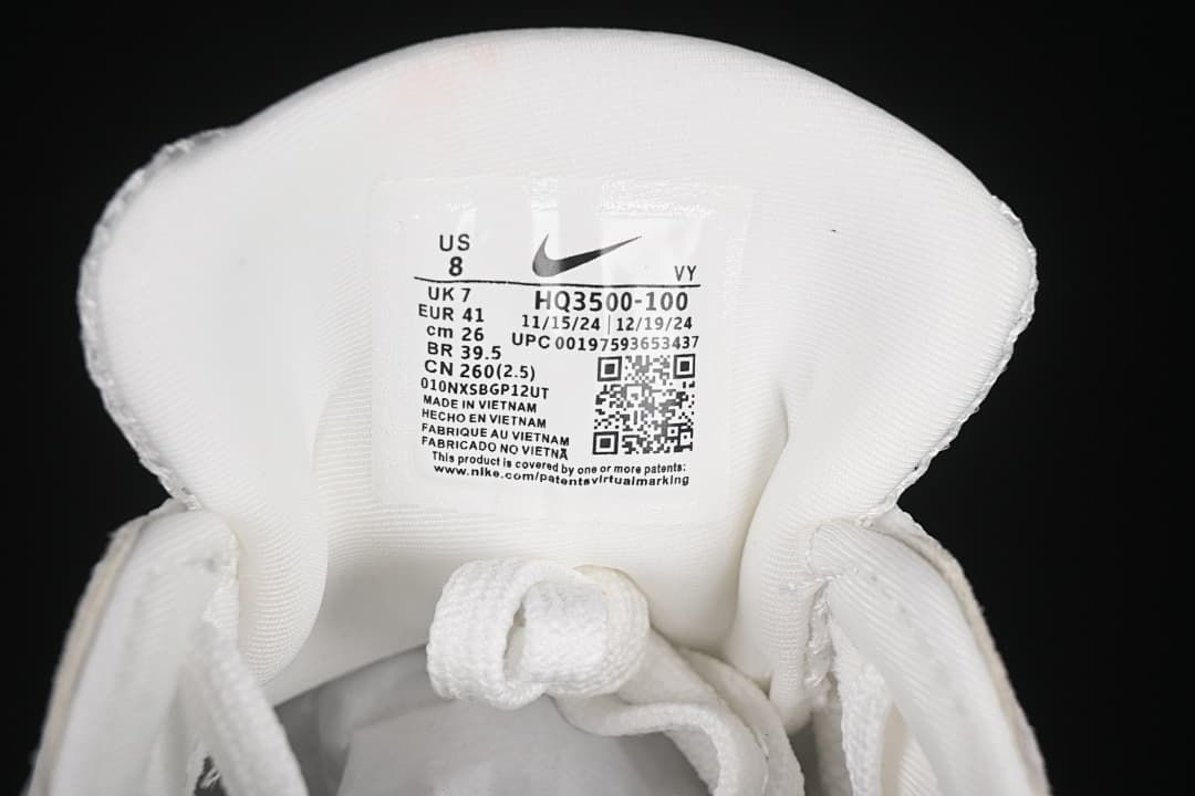 Sneaker tongue size label showing style code HQ3500-100 and sample sizing