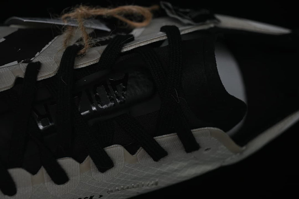 Close-up of the black laces, tongue and upper