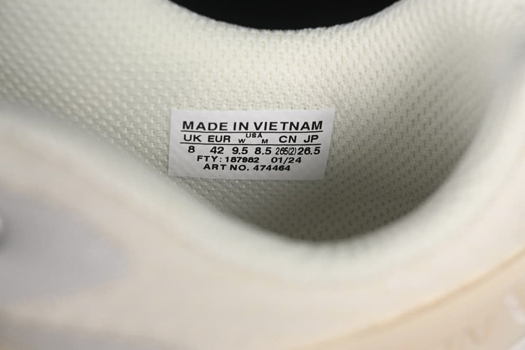 Interior size label showing EU 42 and other size conversions for the photographed sample.