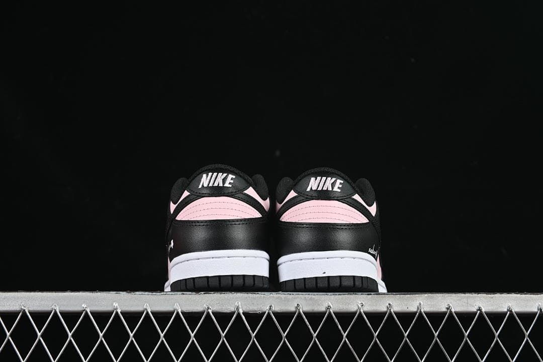 Rear view of the pair showing black and pink heel panels