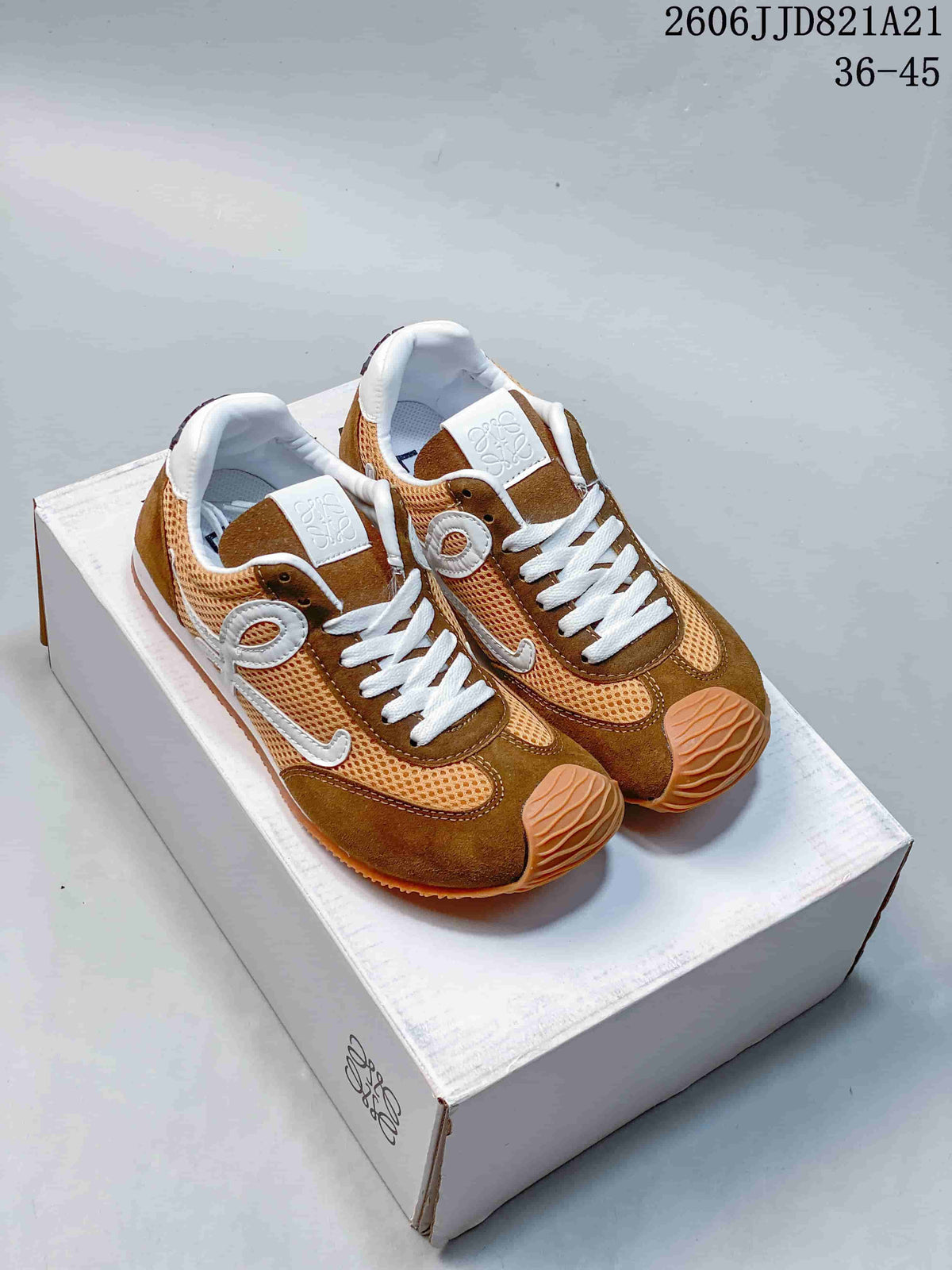 Pair of brown and tan mesh sneakers with white side detailing
