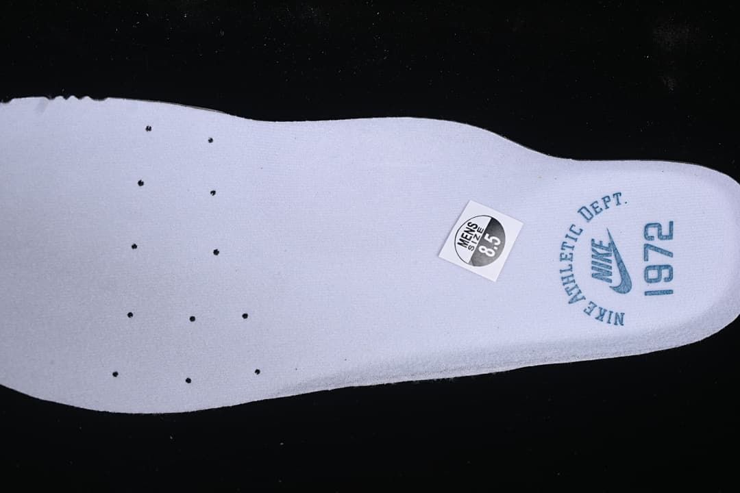 Insole detail with a visible US men's size 8.5 sticker