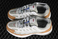 Pair of Nike P-6000 sneakers in gray, off-white, and tan, shown from above