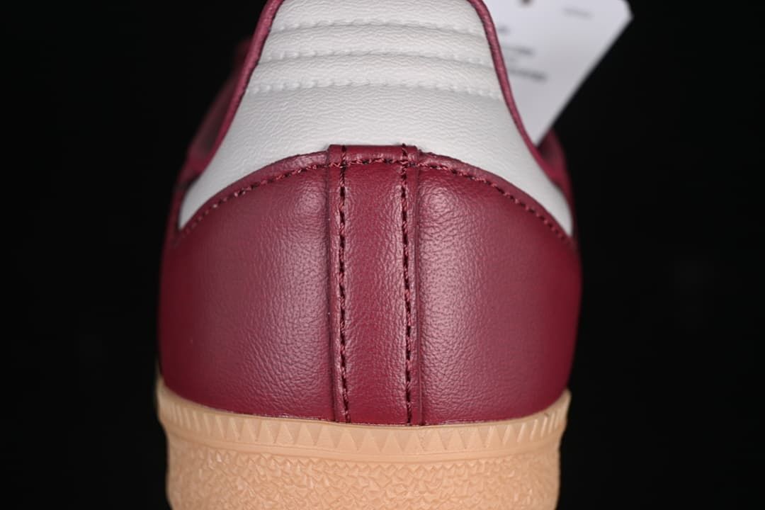 Close-up of the burgundy heel and white heel accent
