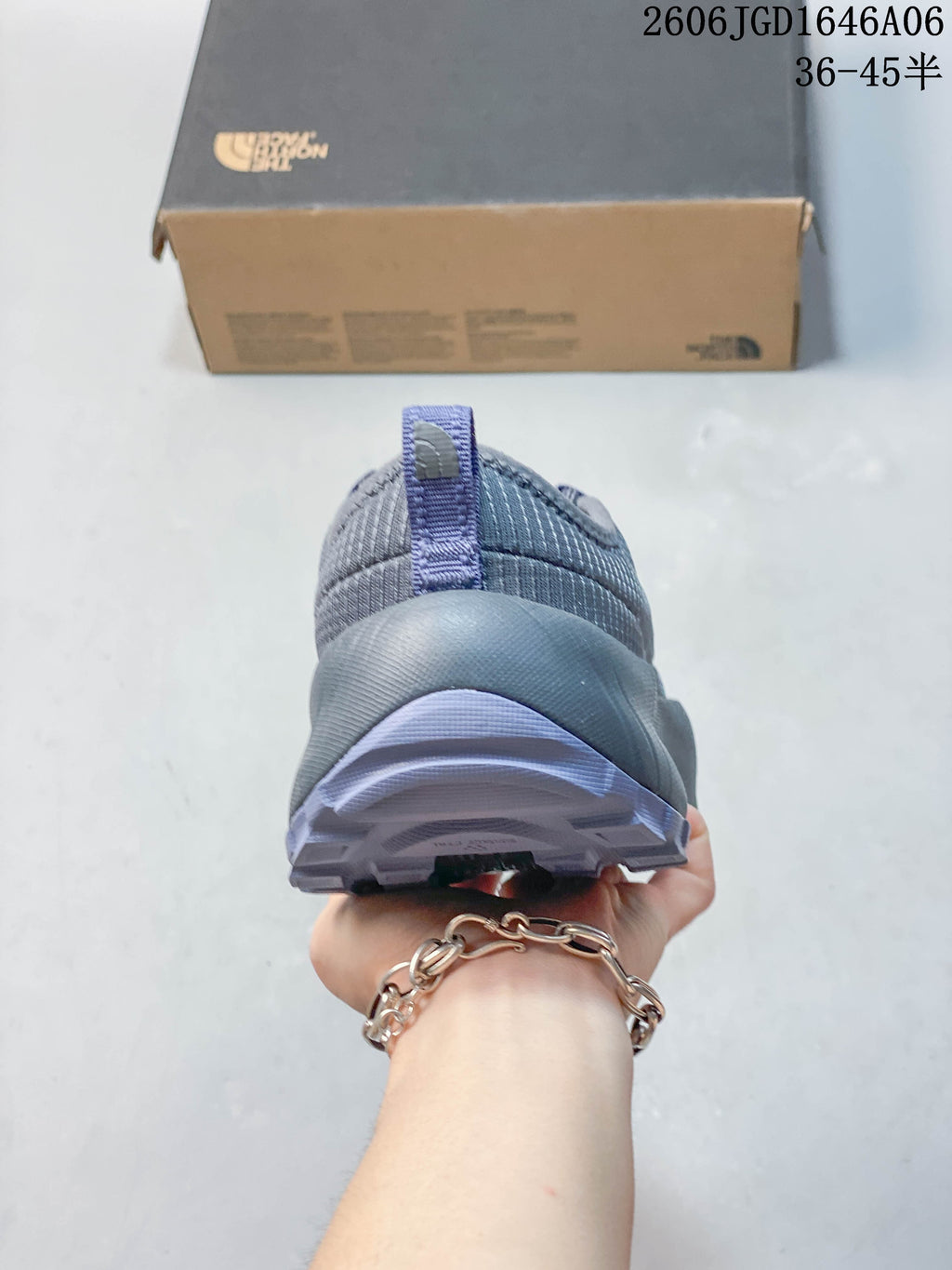 Rear view of the gray mule shoe with a heel pull loop