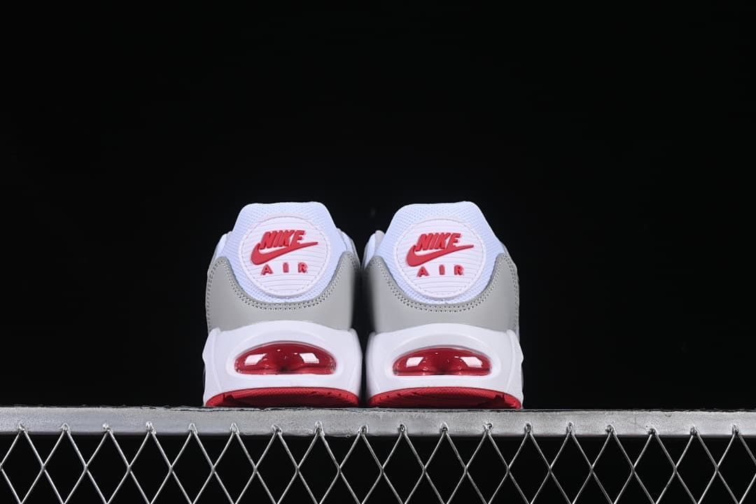 Rear view of both sneakers showing heel details and visible Air units.