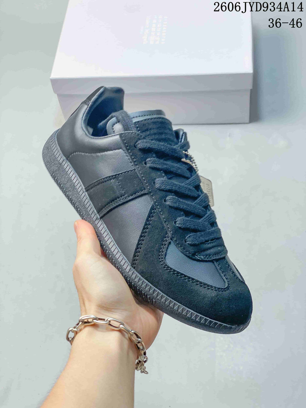 Angled side view of a dark navy low-top sneaker