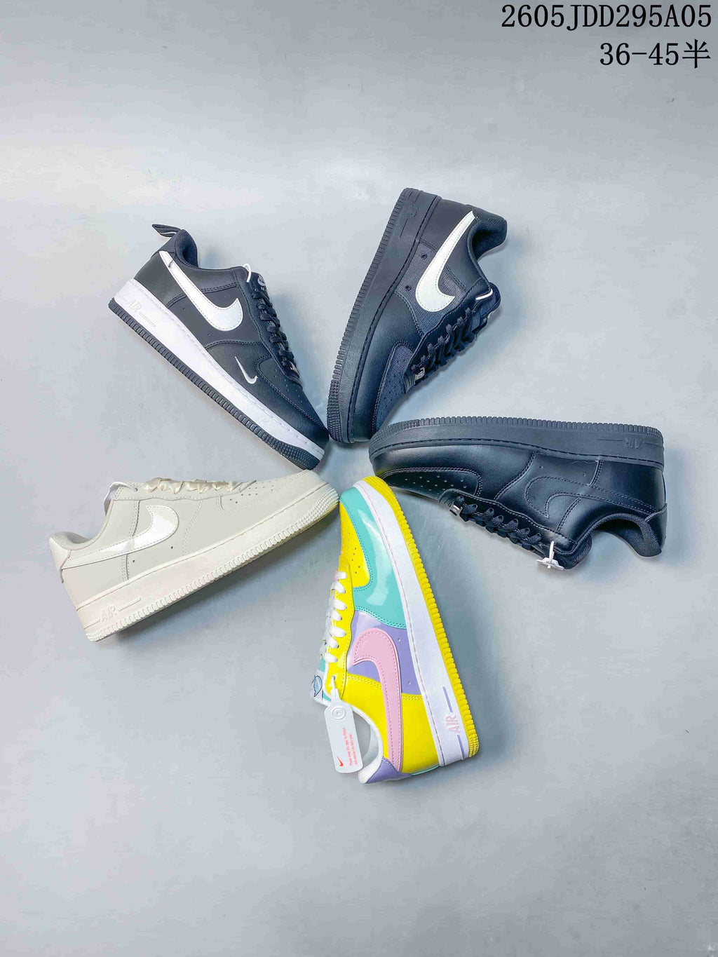 Several Nike Air Force 1 low-top sneakers displayed in different colorways