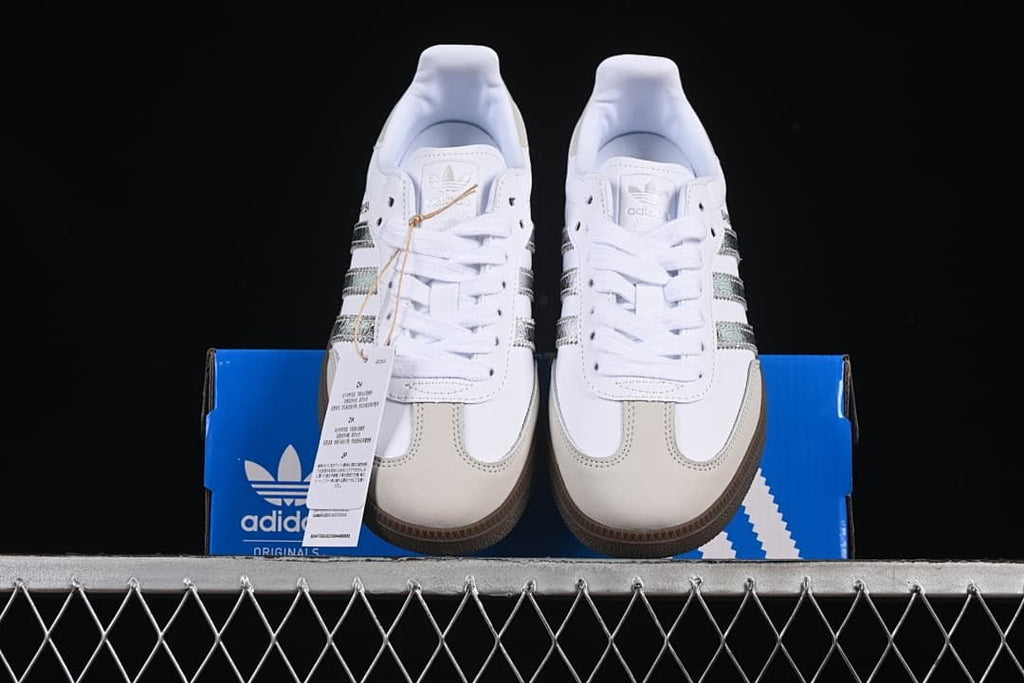 Front view of the pair showing white laces and light neutral toe accents