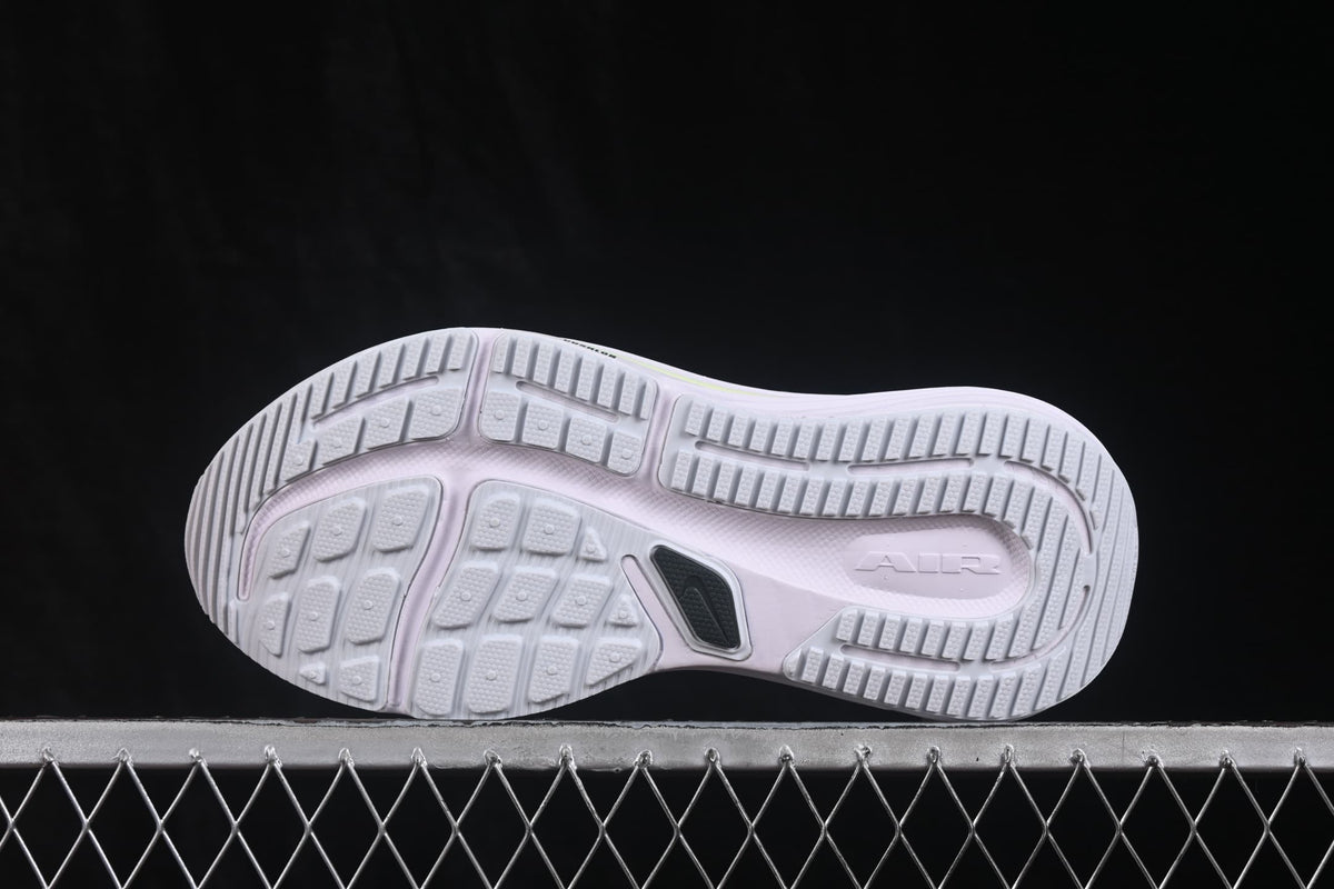 Underside view showing the segmented pale outsole pattern and AIR marking.