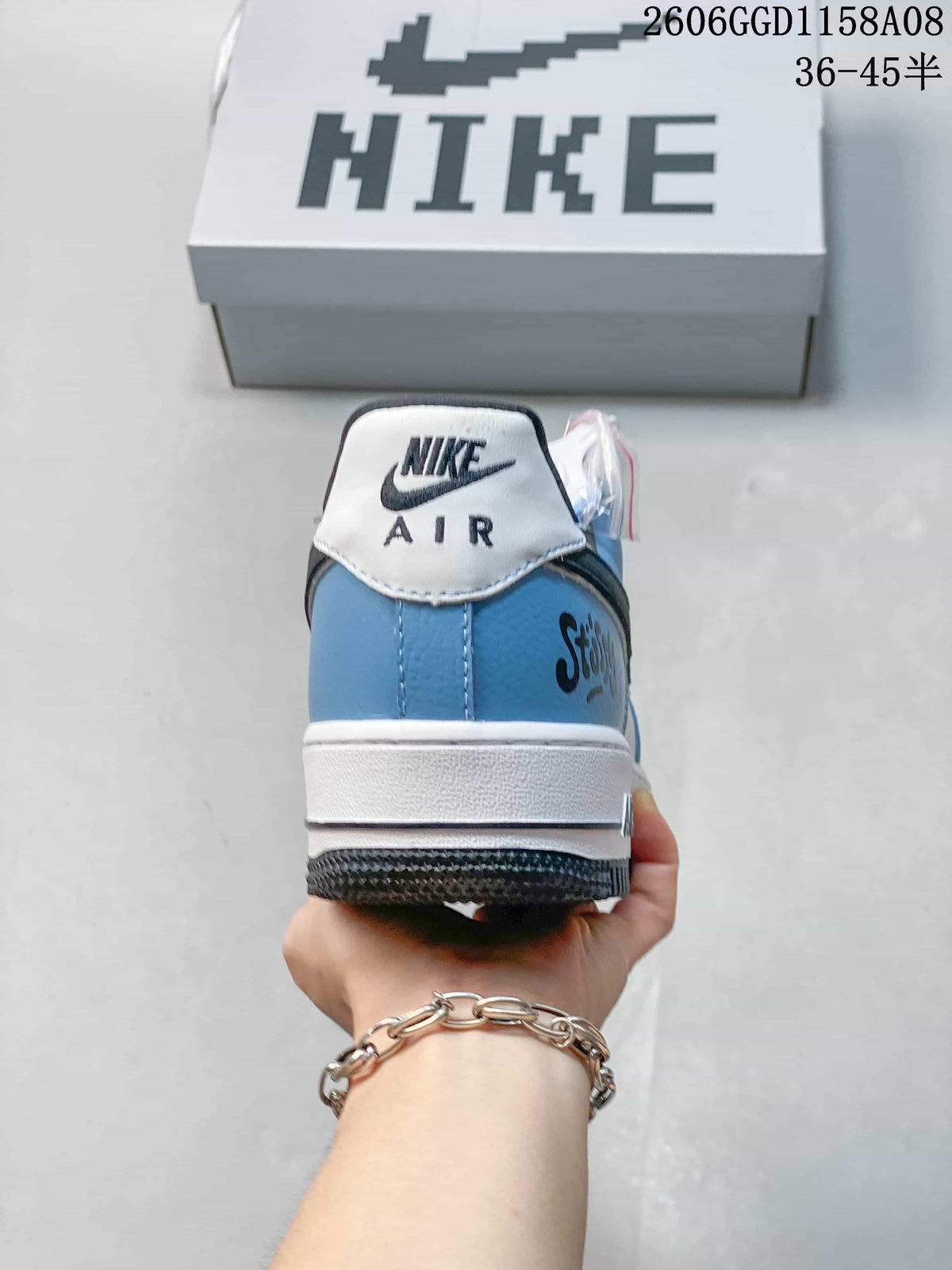 Rear view showing the blue heel panel and heel branding
