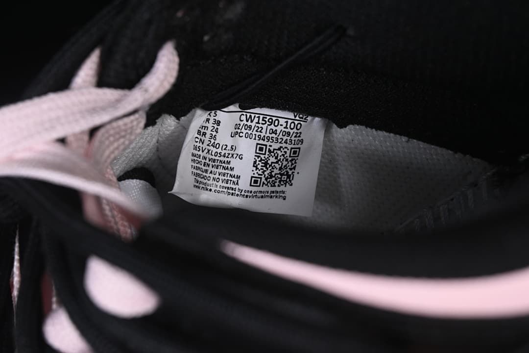 Close-up of the shoe label showing style code CW1590-100