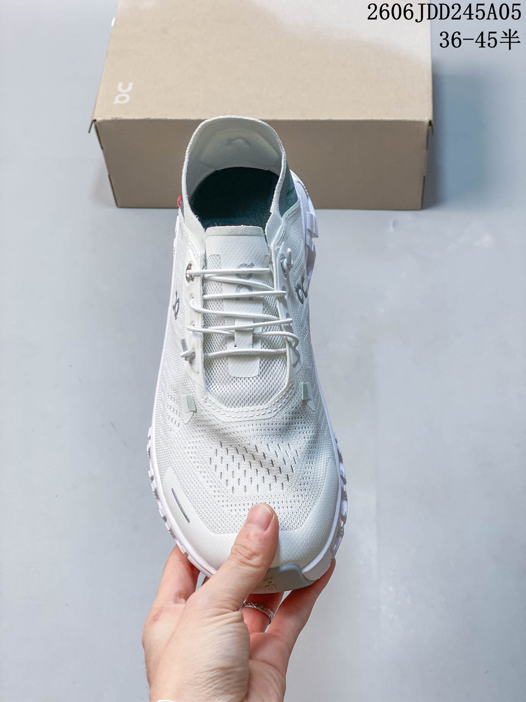 Top view showing the laces, perforated upper, and toe.