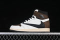 Side view of a brown, white, and black high-top sneaker with a reverse-facing Swoosh
