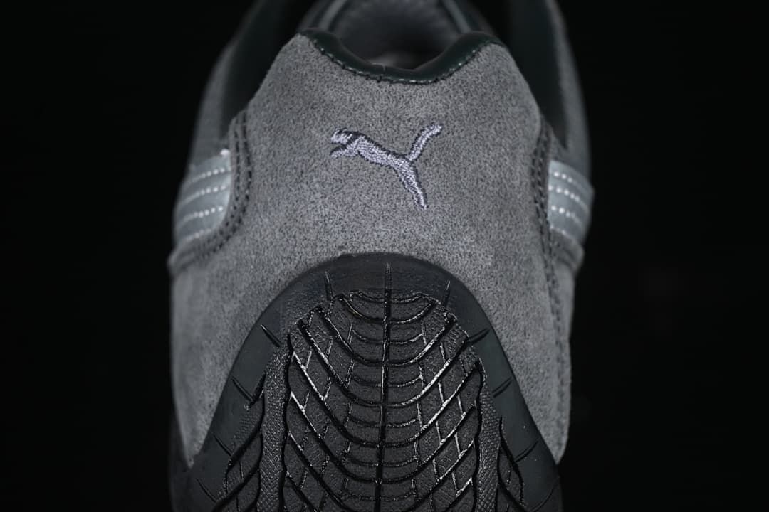 Rear view showing Puma logo and treaded black heel section