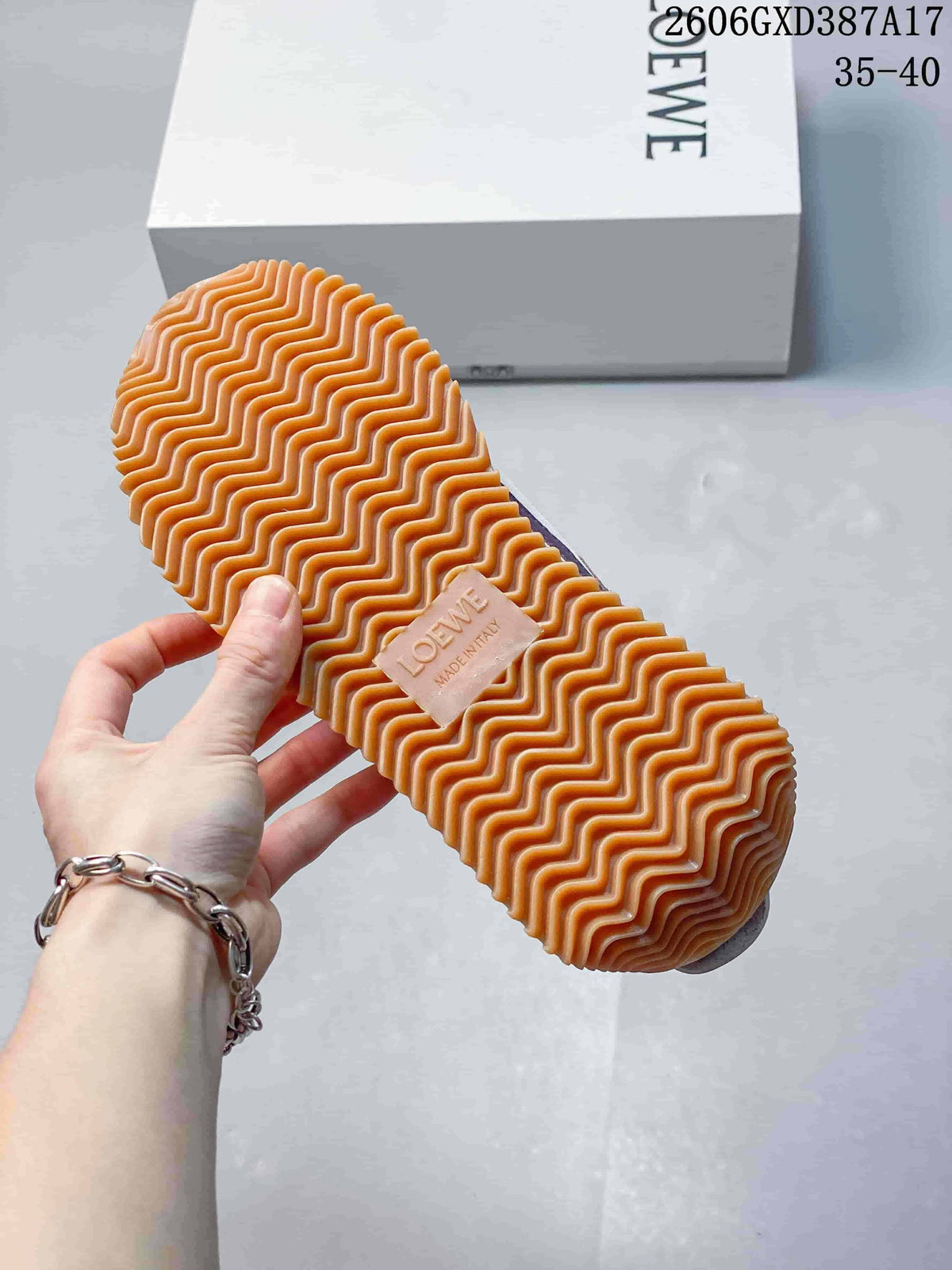 Close-up of the gum-colored outsole showing its wavy tread