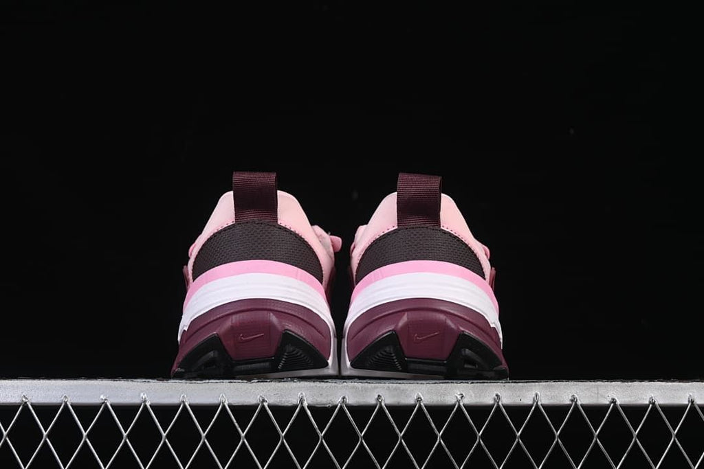 Rear view of both sneakers showing heel panels and outsole details