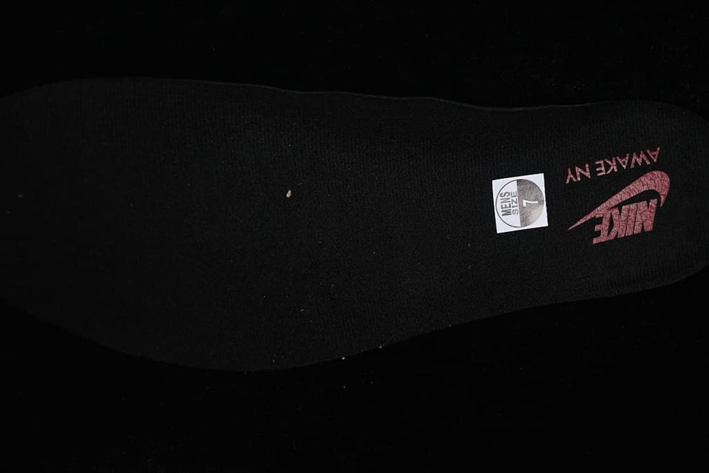 Black insole with Awake NY and Nike branding and a size sticker marked 7.