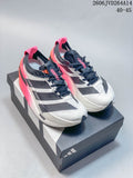 Pair of white Adidas Dropset Elite shoes with navy details and bright pink and orange accents, shown on a shoe box.