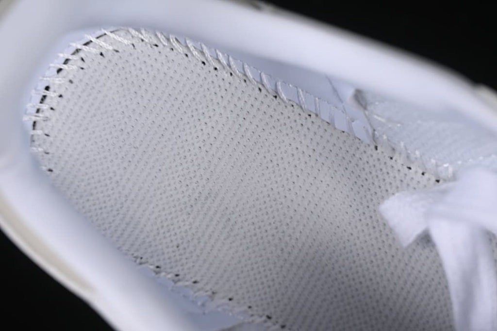 Close-up of the perforated interior lining and stitching