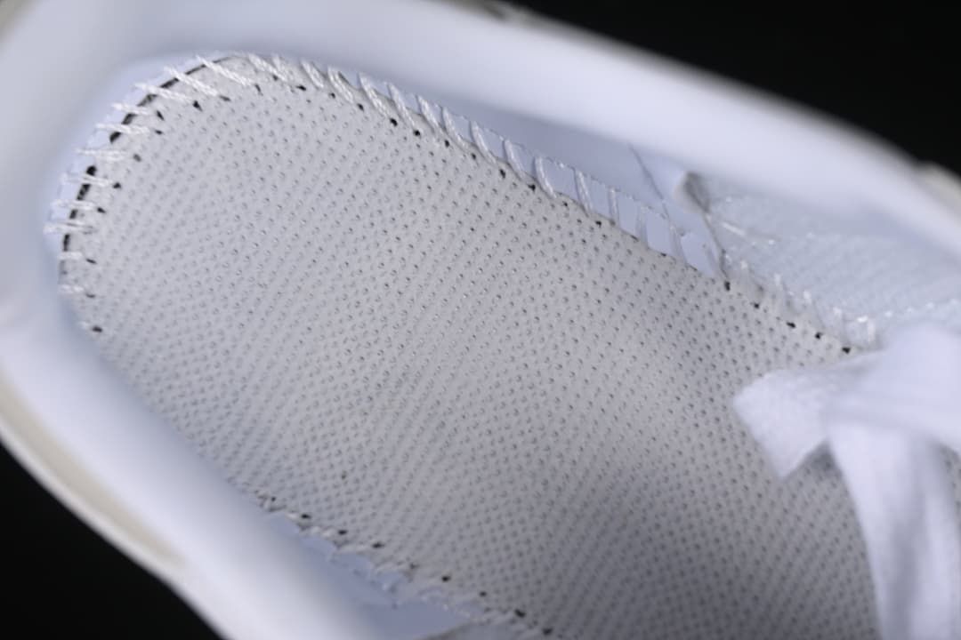 Close-up of the perforated interior lining and stitching