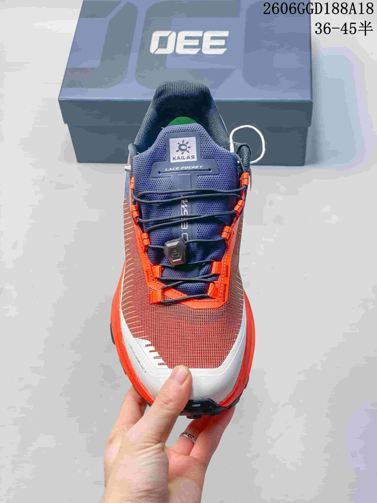 Top-down view showing the shoe's tongue pocket and lace-cinch system