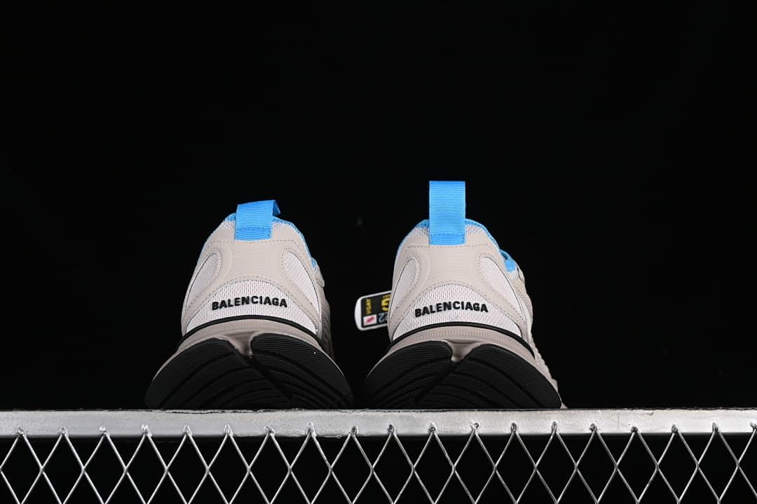 Rear view showing heel branding and blue pull tabs