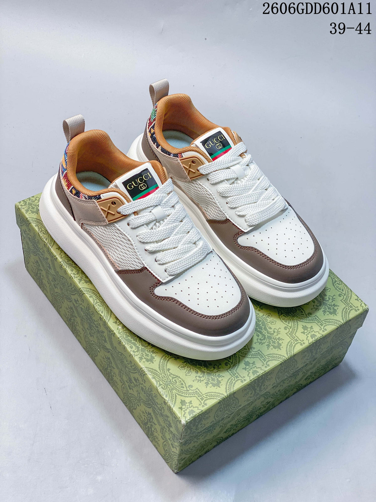 Pair of white and taupe Gucci Screener GG low-top sneakers with multicolor heel accents