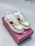 Pair of white and gold-tone Gucci Chunky low-top sneakers with green-and-red side stripes