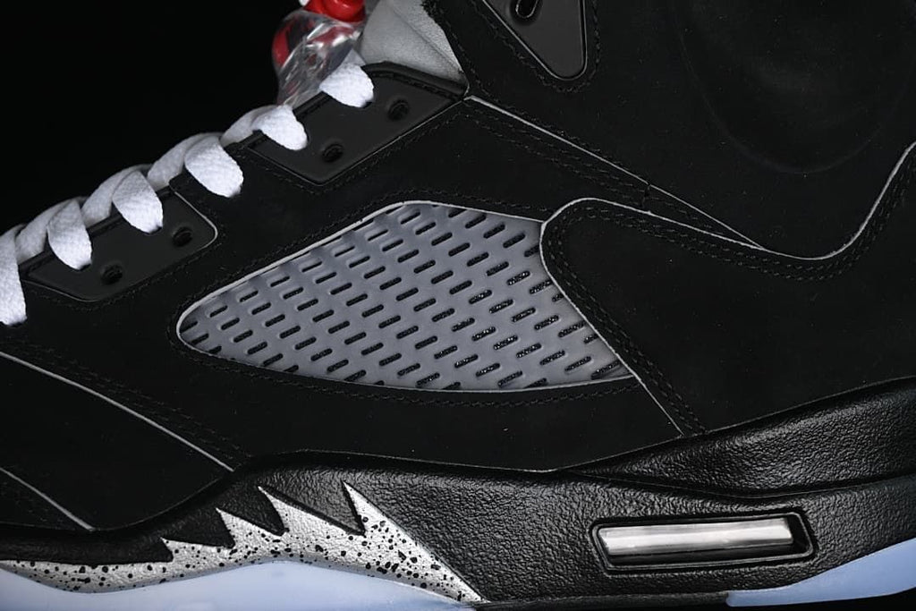 Close-up of the silver side panel, lacing, and midsole